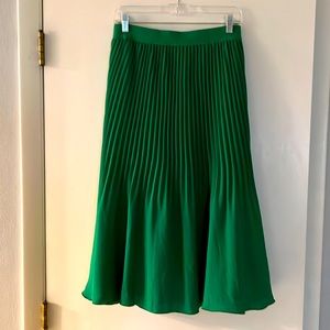 Green pleated skirt